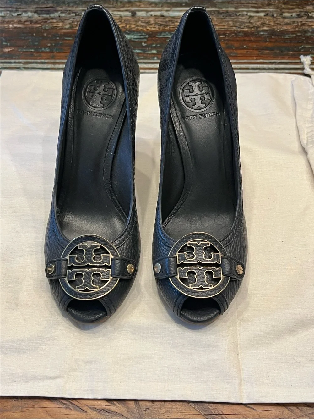 Tory Burch Black Leather Peep-Toe Heels with Logo Medallions